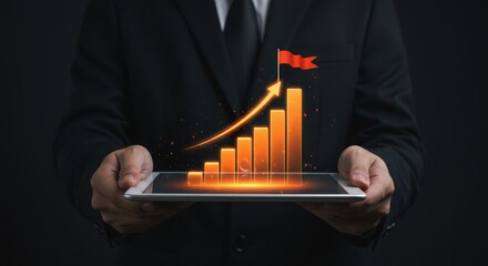 Photo of businessman presents a growth chart on a digital tablet