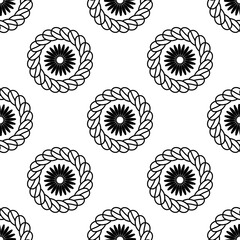 Seamless black and white floral mandala pattern, perfect for textiles, backgrounds, or decorative designs with an elegant, repetitive motif.