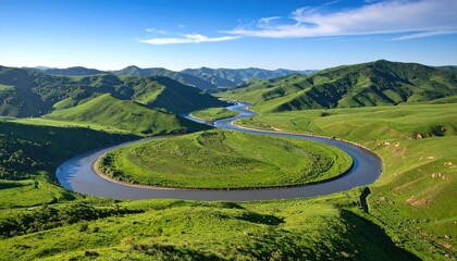 Scenic river meandering through lush green hills