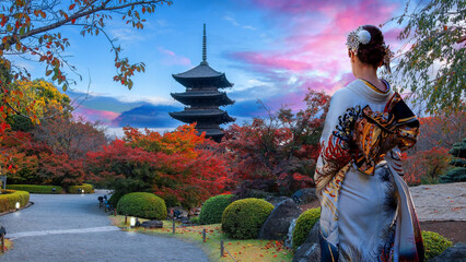 Japanese Woman in Traditional Kimono Dress at Toji Temple in Kyoto, Japan with beautiful garden and...