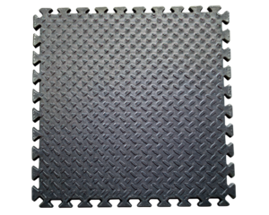 Interlocking rubber floor mat with a diamond plate pattern on a transparent background