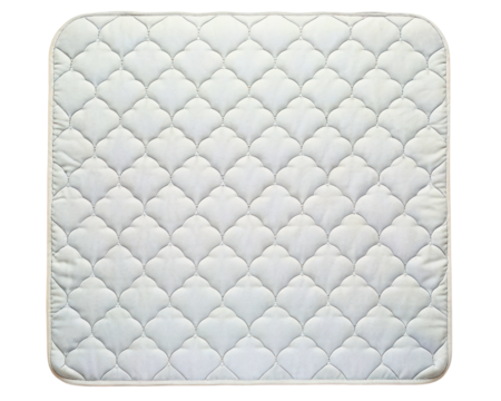 White quilted mattress pad with scalloped pattern and soft texture on a transparent background