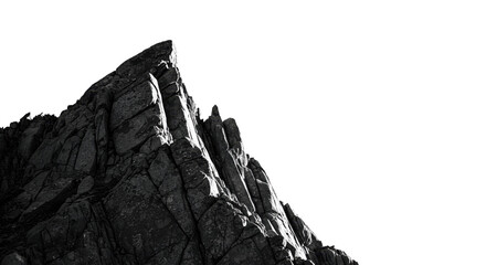 Striking monochrome showcases a jagged mountain peak against a contrasting black background creating a dramatic outdoor landscape.