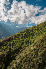 Aerial view of winding mountain walking trail and cable lines in Balagezong, Shangri-la, China