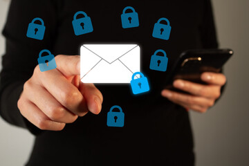 Professional woman pointing at an email icon with a closed padlock, encrypted email