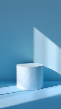 Shadowed pedestal in front of a gentle pastel blue gradient wall, empty mockup