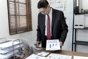 close up image of manager on desk, executive marketing analyst