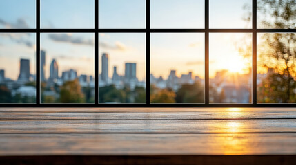 Fototapeta premium Sunset view through glass window showcasing city skyline with warm light reflecting on wood