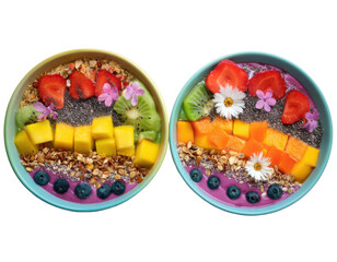 Top-down view of two vibrant smoothie bowls arranged in rainbow layers with colorful toppings