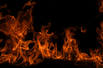 Texture of fire on a black background. Abstract fire flame background, large burning fire.