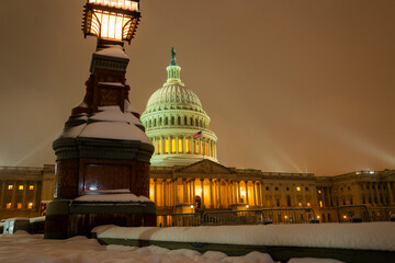 Washington D. C. in night winter snow. Capitol Building in night. Washington city Capitol. United...