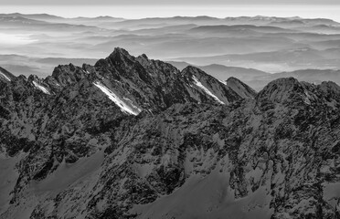 lack and white panorama of the High Tatras, snowy peaks in winter, aerial view. Slovak and Polish...