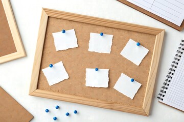 Minimal bulletin board with white notes, clean frame and blue tacks