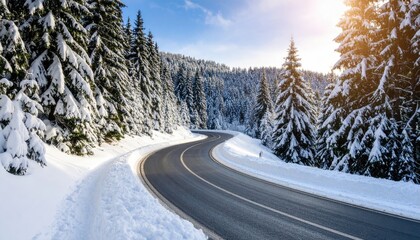 Fototapeta premium Snowy mountain road, sunlit trees