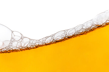 Beer and beer foam and white background