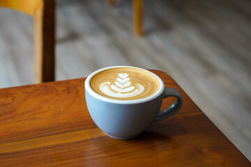 Hot Macadamia Latte, Indonesia, captured on July 13, 2025. Creamy espresso with macadamia nut milk, served warm in a ceramic cup on a table for a rich, nutty flavor