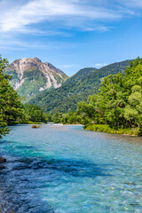 Scenic View of Azusa River and Alpine Landscape of Kamikochi in the Northern Japanese Alps in summer season