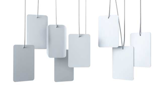 A collection of white tags hanging from a string