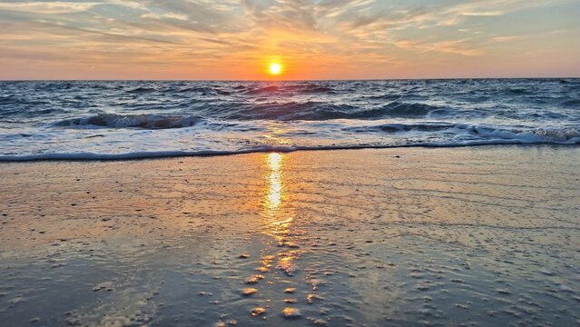 Footstep print on sand during sunset on beach, Preveza, Greece