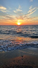Footstep print on sand during sunset on beach, Preveza, Greece