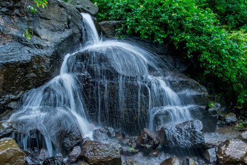 A waterfall during the monsoons near Pune India. Monsoon is the annual rainy season in India from June to September.