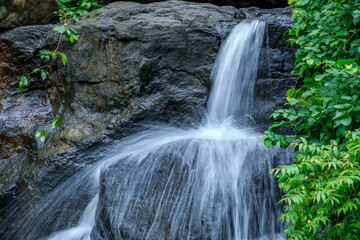 A waterfall during the monsoons near Pune India. Monsoon is the annual rainy season in India from June to September.