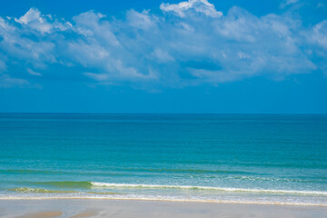Nature of the ocean and blue sky Summer with sunshine, sandy beaches, clear blue waters sparkling...