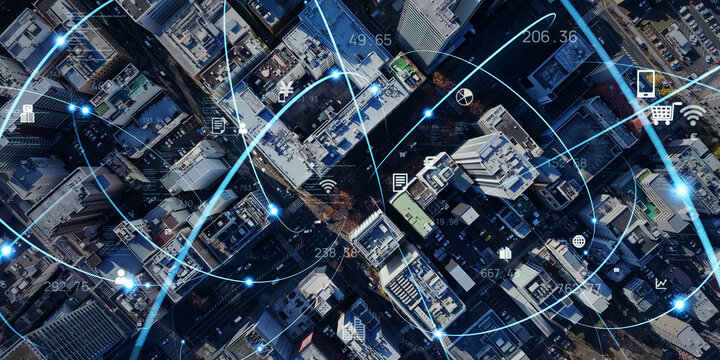 現代都市の真俯瞰ドローン空撮風景と通信ネットワークのコンセプト　バナー・広告向け横長ビジュアル