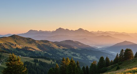 Obraz premium Mountain range landscape with green trees and a warm sunset sky.