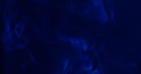 Haze flow. Color fume. Defocused blue neon ink in water vapor mist creative spreading on abstract...