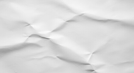 Obraz premium Crumpled white paper texture showing shadows and highlights.premium paper texture photo for poster, banner, and pamphlet background