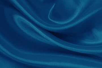 Dark blue fabric cloth texture for background and design art work, beautiful crumpled pattern of silk or linen.
