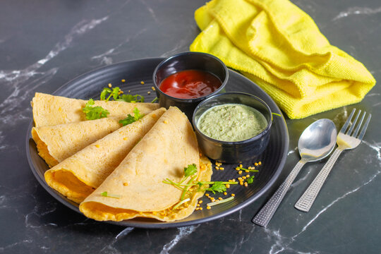 Moong dal chilla is a savory Indian pancake made from ground moong lentils, spiced with herbs, onions, and green chilies, perfect for healthy breakfast.
