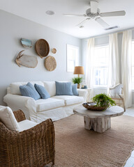 Bright and Breezy Coastal Living Room with White Sofa, Natural Decor, and Inviting Atmosphere