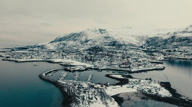 Snow Mountains And Harbour In Lodingen Fishing Village In Lofoten, Norway. Aerial Drone Shot