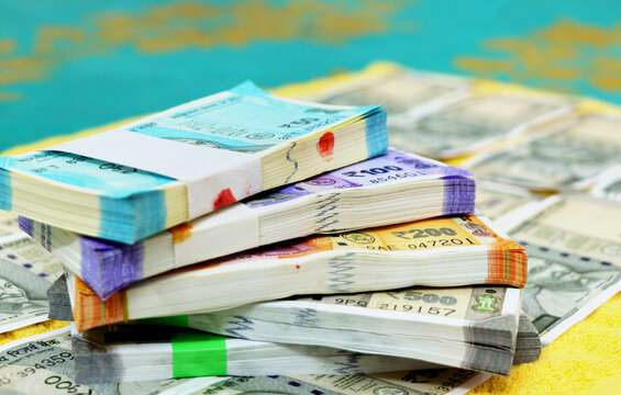 piles of new indian currency notes rupees 50,100,200 and 500