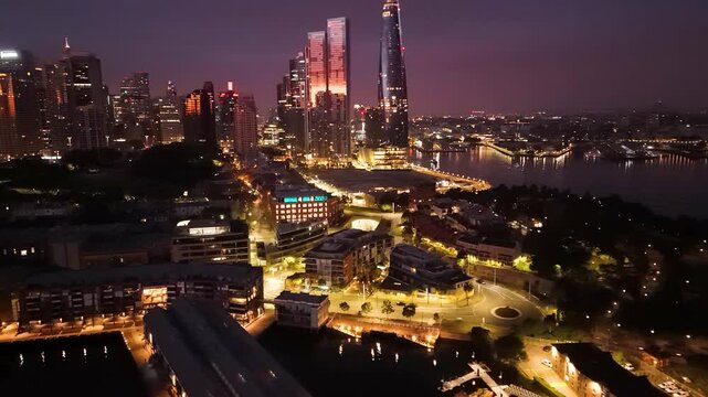 Aerial drone view of Barangaroo waterfront precinct and Sydney City, NSW Australia during an early morning sunrise in July 2025     