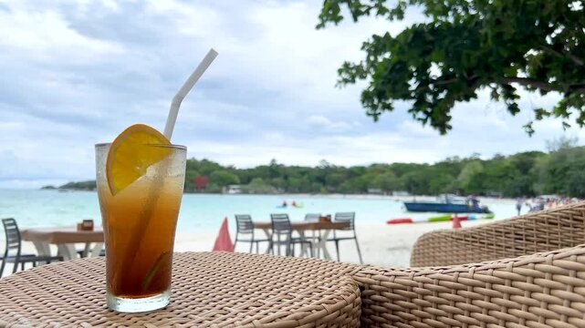 Iced Cocktail with Orange Slice on Rayong Beach Table
