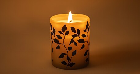A lit cylindrical candle with a warm, inviting glow and black leaf designs on a beige background, Generative AI.