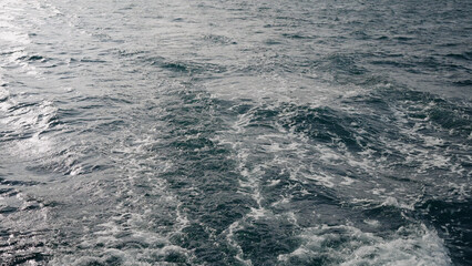 wake trail behind boat in Indian ocean