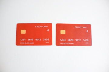 credit card, modern payment tool, transaction tool, two red credit cards isolated on a white...