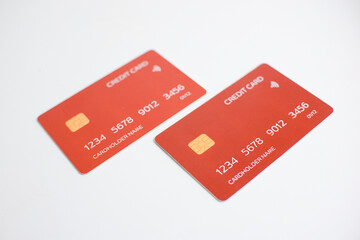 credit card, modern payment tool, transaction tool, two red credit cards isolated on a white...