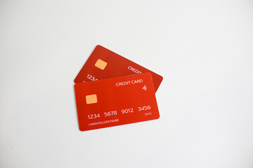 credit card, modern payment tool, transaction tool, two red credit cards isolated on a white...