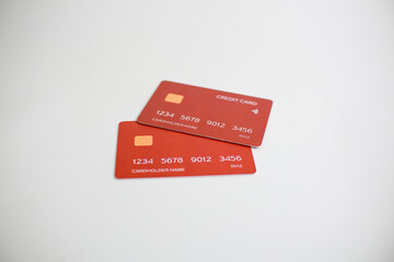credit card, modern payment tool, transaction tool, two red credit cards isolated on a white...