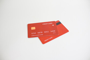 credit card, modern payment tool, transaction tool, two red credit cards isolated on a white...