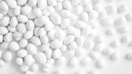 Close-up of many white, round candies