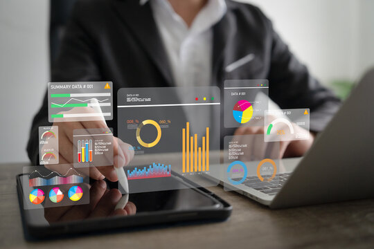 Analysts using big data dashboards to assess performance, KPIs, strategic decisions with AI and technology.
