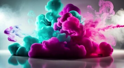 Rich clouds of teal and magenta smoke intertwine in mid-air, forming a vivid and fluid composition. The sharp contrast and colorful textures give the scene a surreal and captivating look, ideal for ab