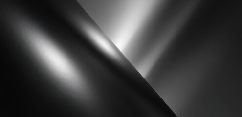 Abstract grayscale metallic shapes intersecting