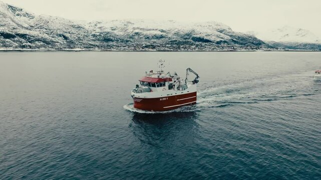 Fishing Boat Across Fjord Near Lodingen In Nordland County, Norway. Aerial Drone Shot